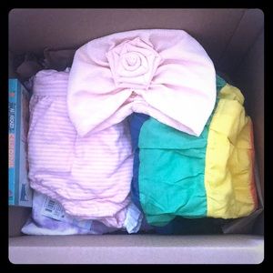 Box of baby girl clothes.  SOLD.